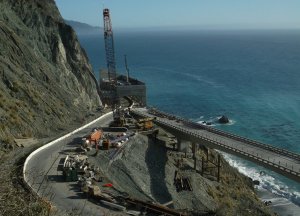 Construction of the rock shed. Image by the California Department of Transportation.